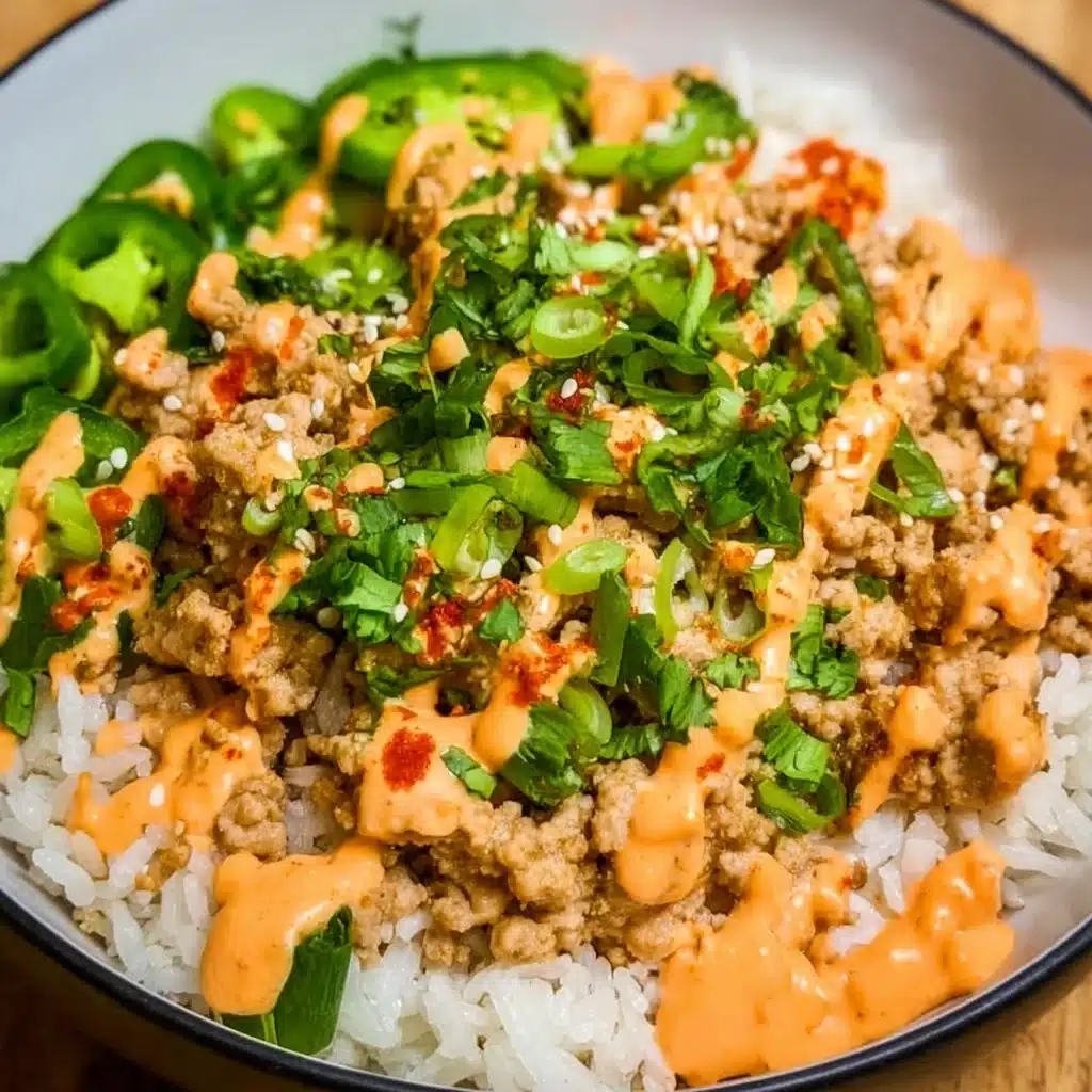 Ground turkey rice bowl with Bang Bang sauce and fresh vegetables