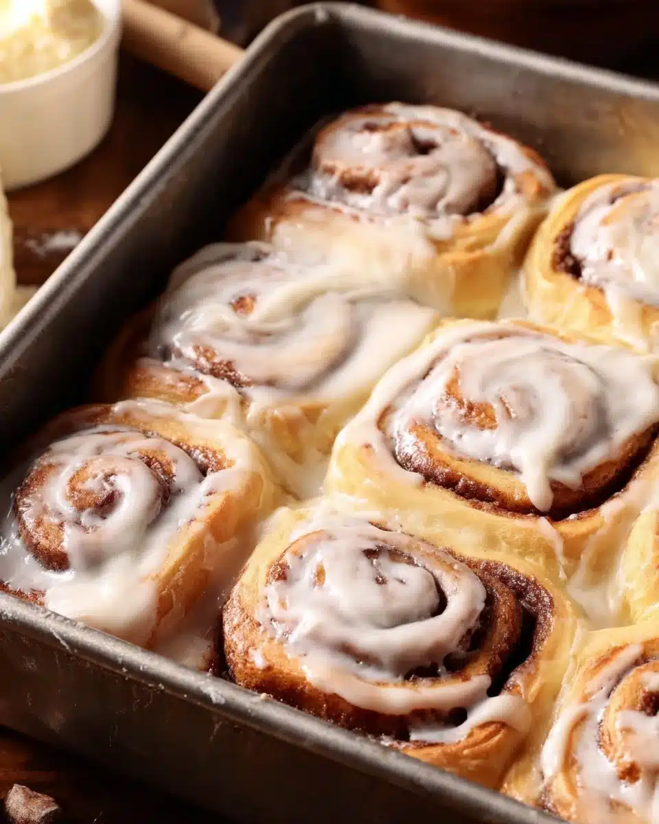 Freshly baked best cinnamon rolls ever, golden brown and gooey icing