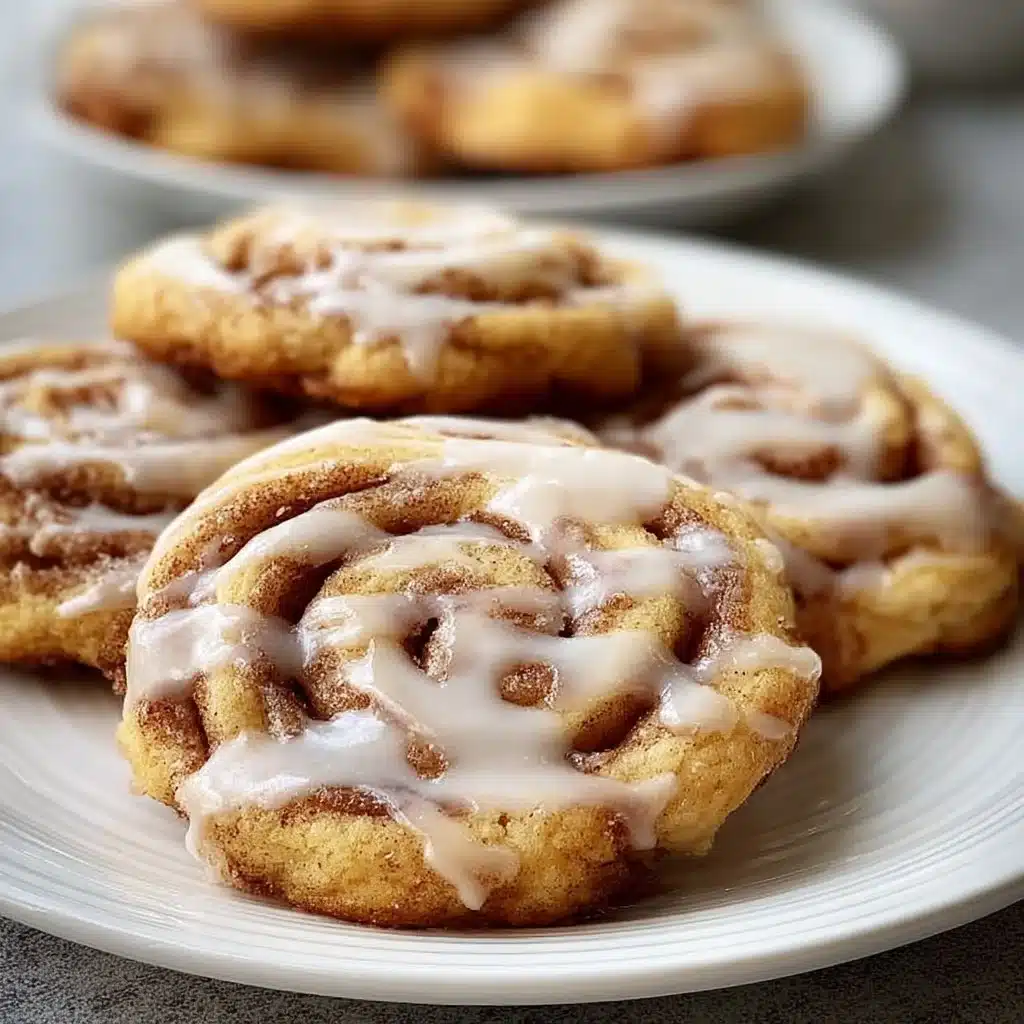 Freshly baked cinnamon roll cookies with icing on top