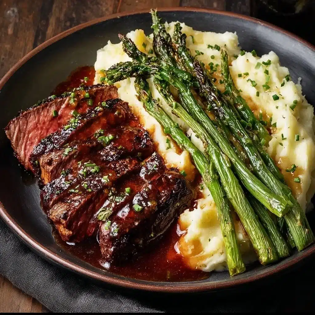 Easy gourmet steak dish with mashed potatoes and asparagus on a plate