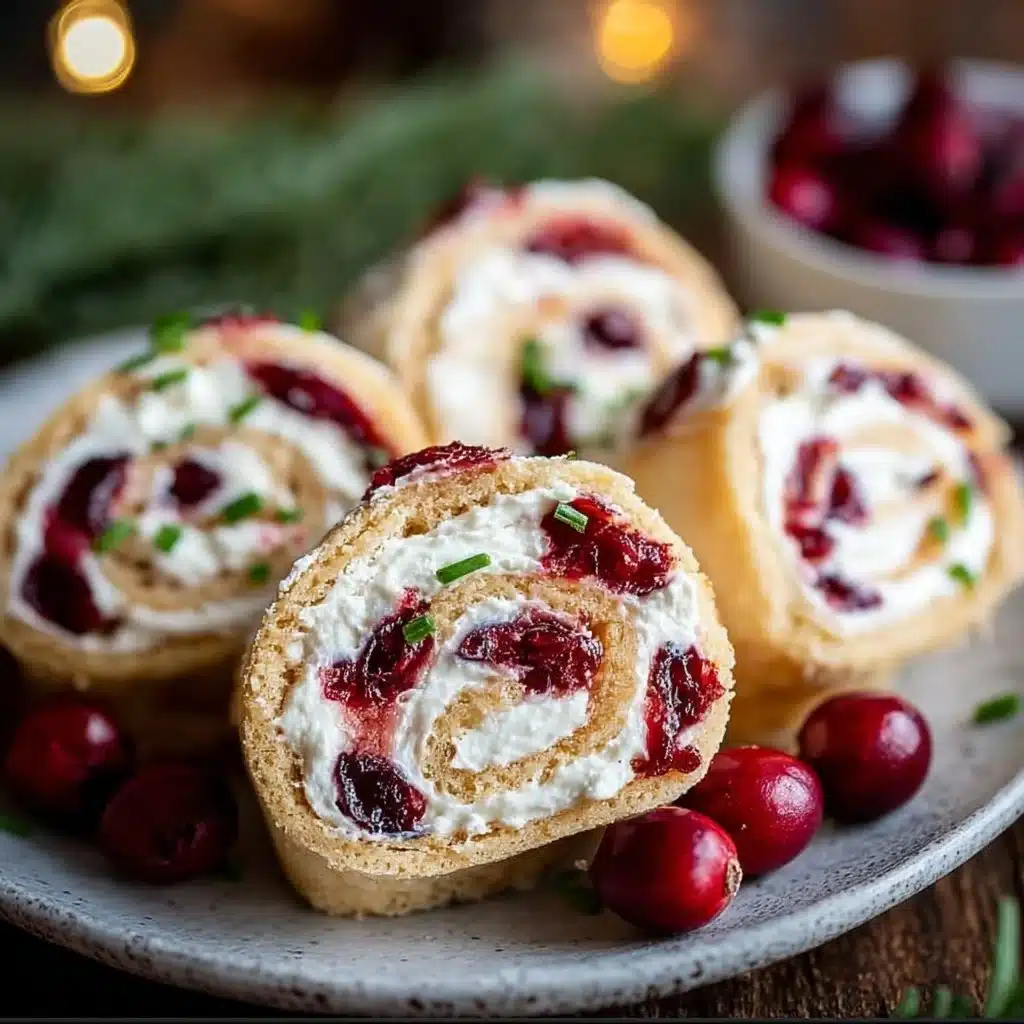 Festive Christmas cranberry roll ups on a holiday-themed platter