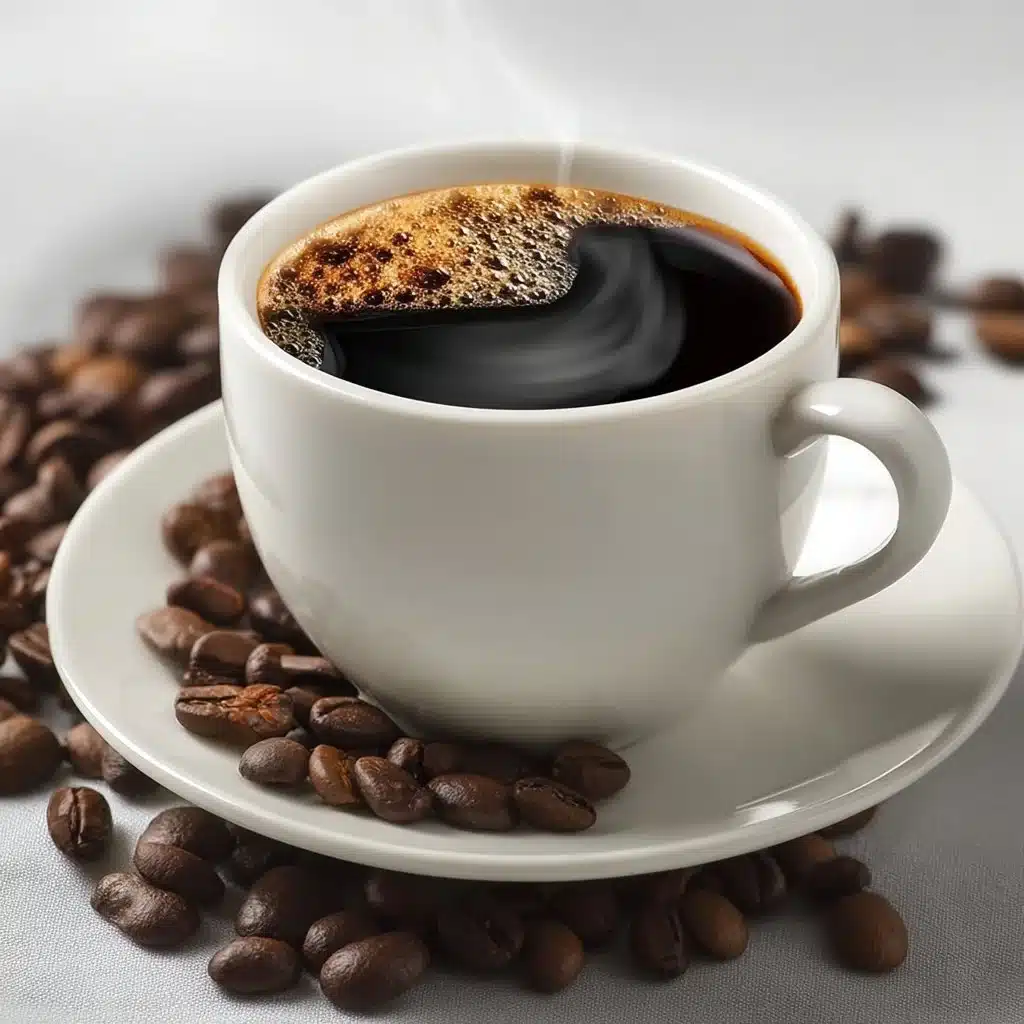 A cup of Roasted Fig Coffee with figs and coffee beans on a wooden table