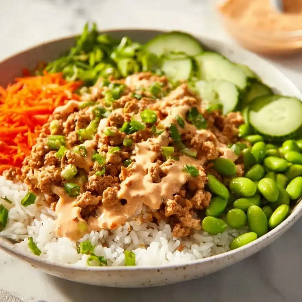 Ground turkey rice bowls with Bang Bang sauce served in a colorful dish