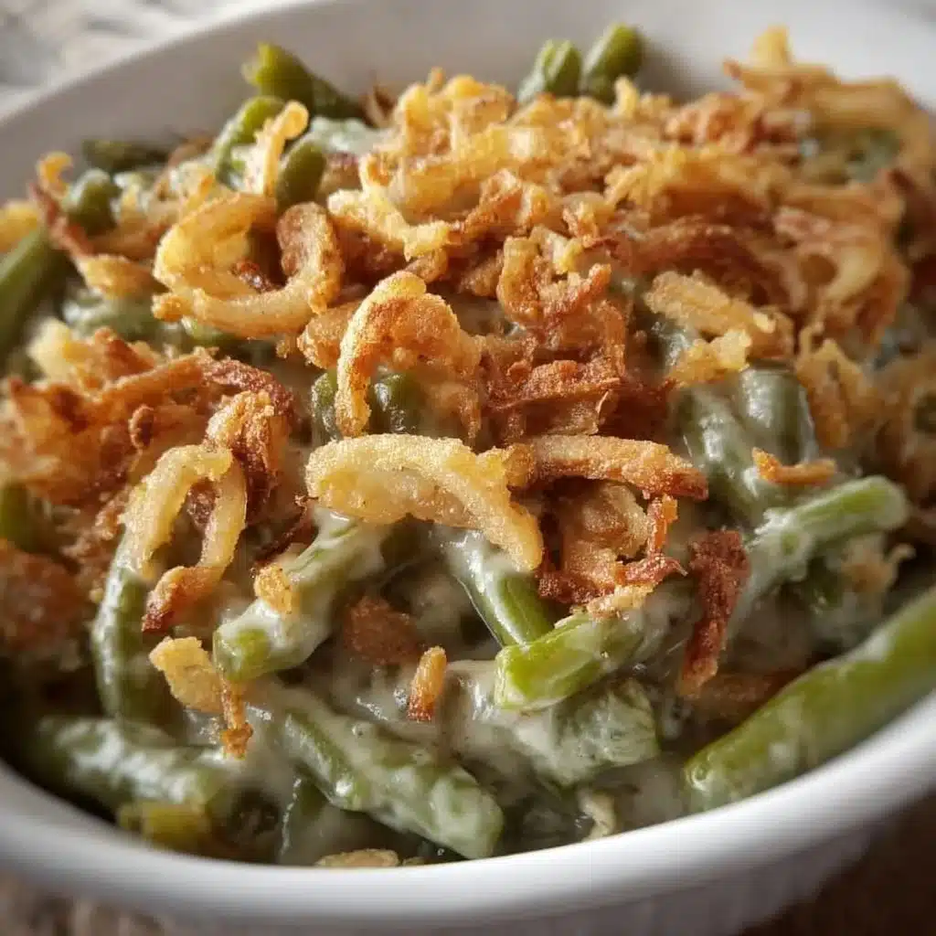 Classic Campbell's Green Bean Casserole topped with crispy onions and creamy sauce