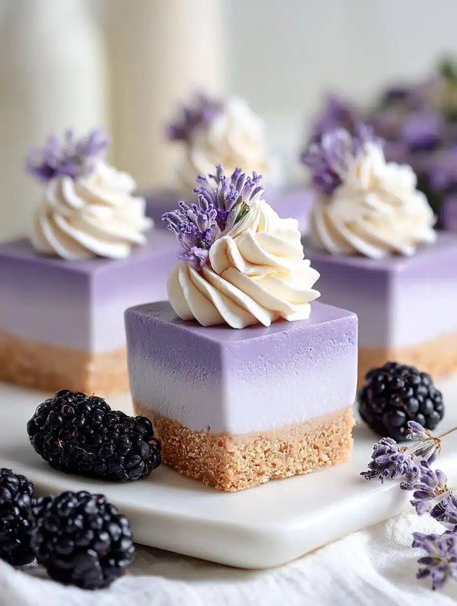 Delicious blackberry lavender cheesecake bites on a plate