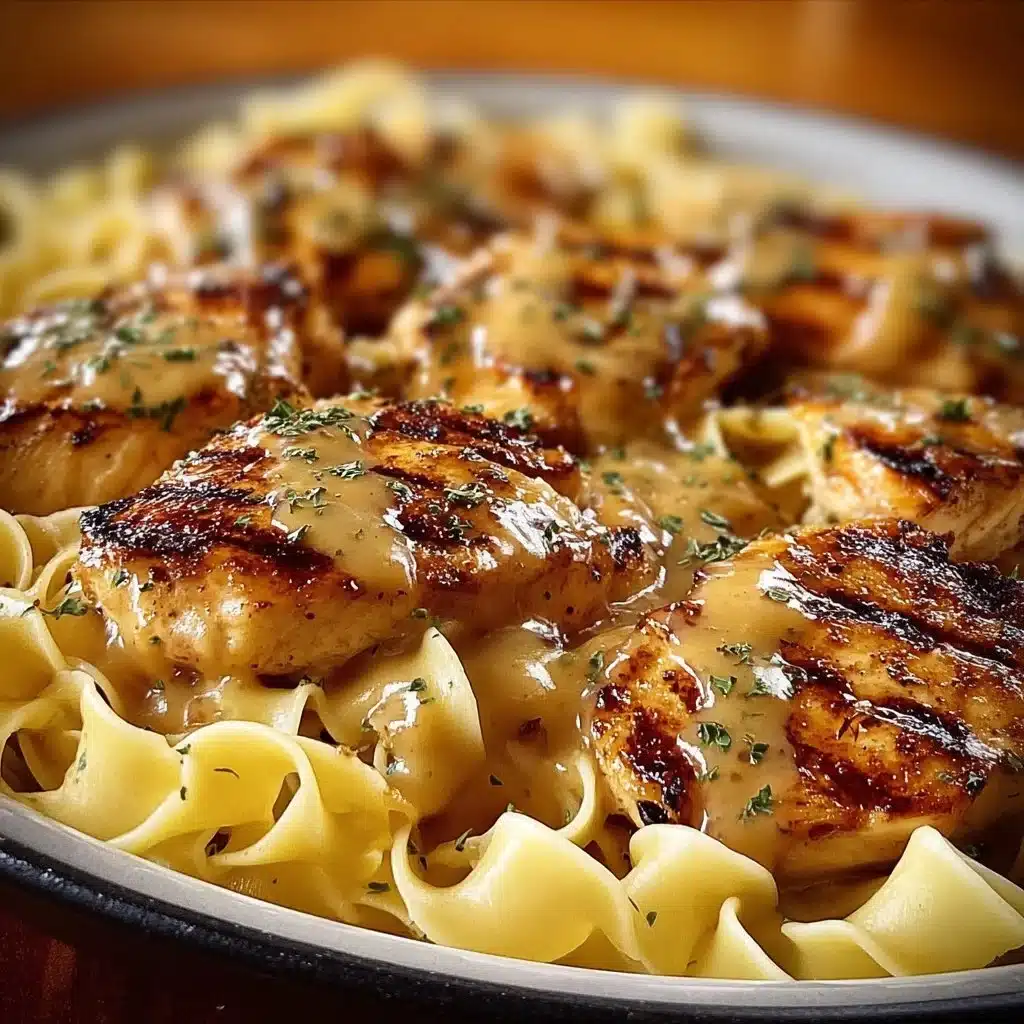 One-Pan Chicken served with buttered noodles, a quick and tasty dinner option.