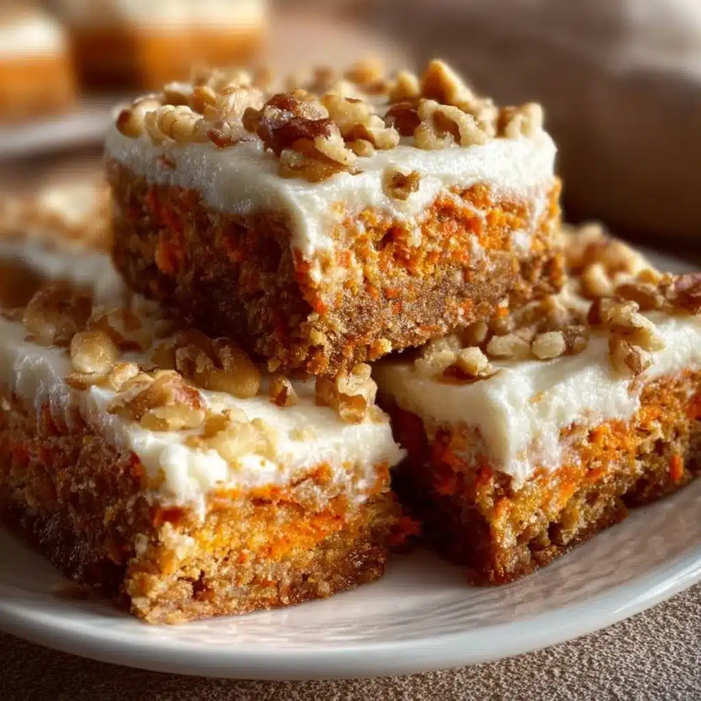Cottage Cheese Carrot Cake Bars topped with frosting and walnuts in a baking dish