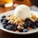 Homemade blueberry crisp with a crunchy oat topping