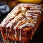 Delicious cinnamon swirl banana bread sliced on a wooden board