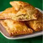 Golden corned beef and cabbage turnovers on a plate