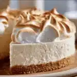 Delicious Marshmallow Whip Cheesecake topped with fluffy marshmallow cream.