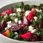 Roasted beet and kale salad with feta cheese and walnuts