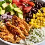 Delicious Macro-Friendly Chicken & Black Bean Burrito Bowl with fresh toppings